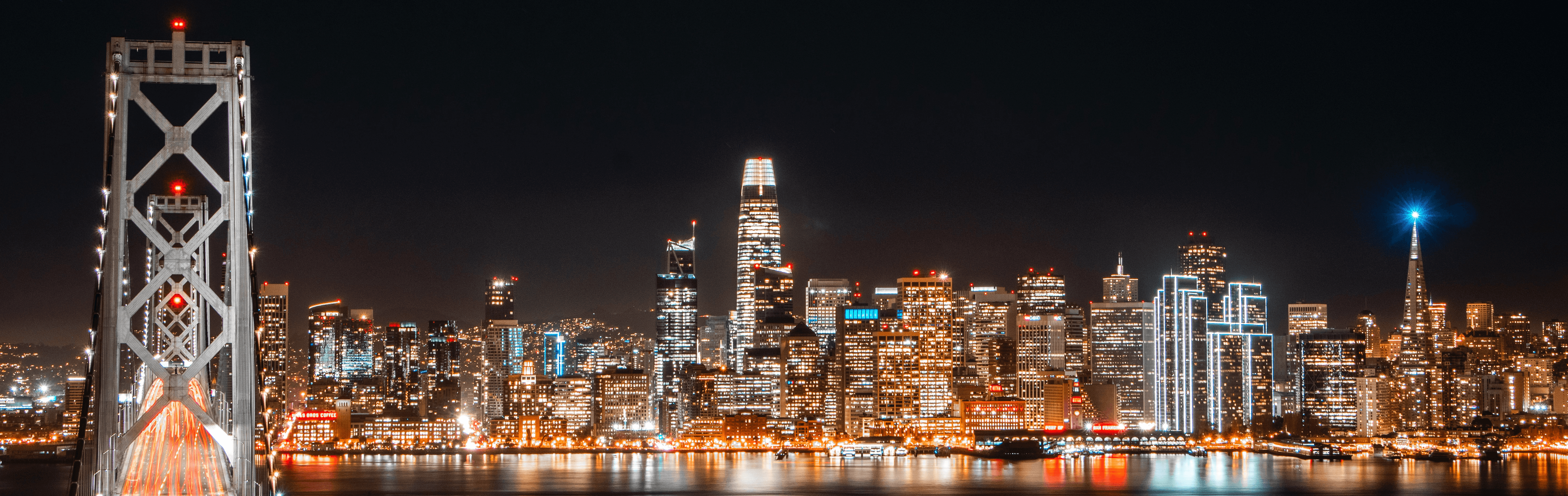 SF skyline with bay bridge in foreground